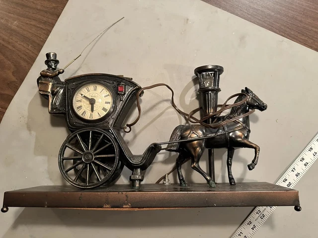 Vintage Metal United Clock Horse and Carriage model 701 Light Works.