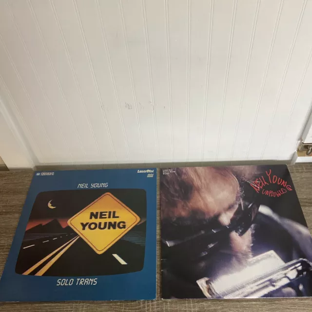 Neil Young - Lot Of 2 Laserdiscs- Solo Trans 1984 / Unplugged ‘93 LD Laser Disc