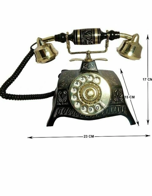 Teléfono fijo vintage negro antiguo para decoración de oficina con esfera giratoria que funciona