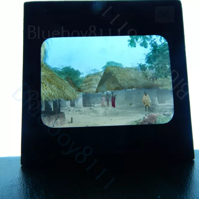 Colonial west Africa native village huts magic lantern