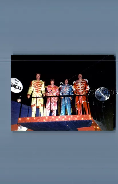 Found Color Photo J_1014 View Looking Up At The Beatles Statues On Balcony