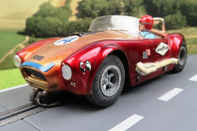 Voiture Slot Racing AC Cobra 1:24 – Châssis Métal + Carrosserie Lexus – Toptoys Unicar – Occasion