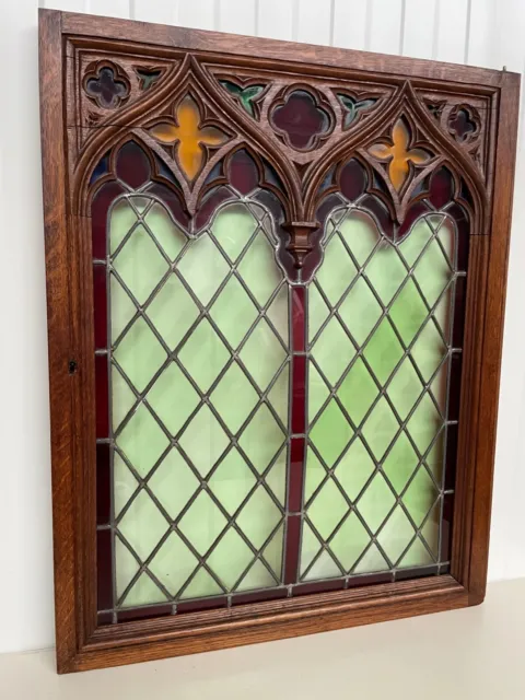 An Exceptional French Gothic Revival Stained glass door panel Carved in oak