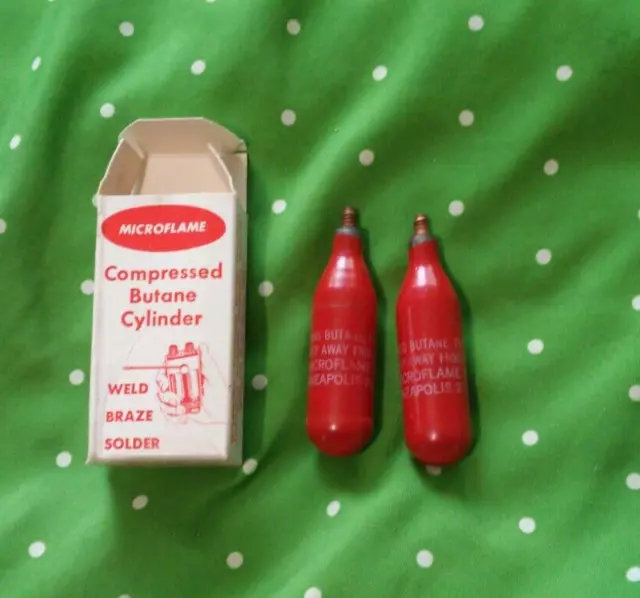 Microflame compressed Butane cylinders x 2 new old stock with box Microflame compressed Butane cylinders x 2 new old stock with box