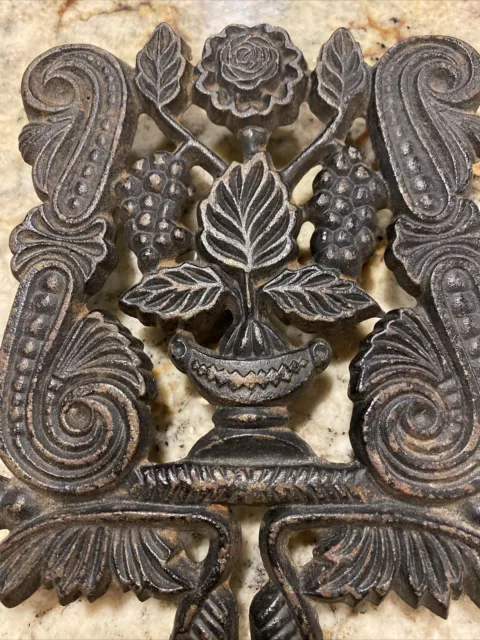 VINTAGE Unmarked GRAPE - FLOWER Cast Iron Footed Trivet 8” x 4.5"