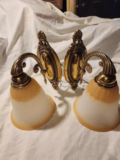 solid brass sconces pair with frosted glass globes maid in Spain 