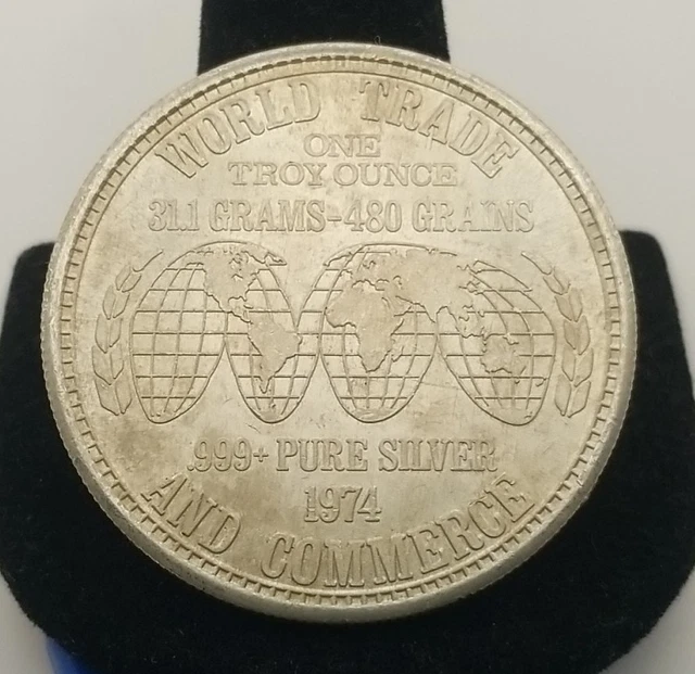 1973 'WORLD TRADE AND COMMERCE' 1 OZ .999 Silver Art Bar / 25C