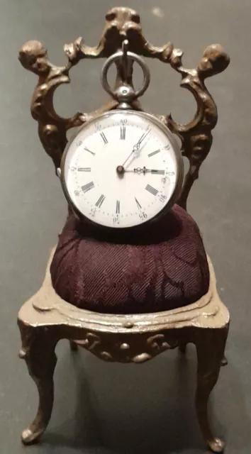 porte montre de col & pique aiguilles chaise décor chérubin en bronze XIX ème