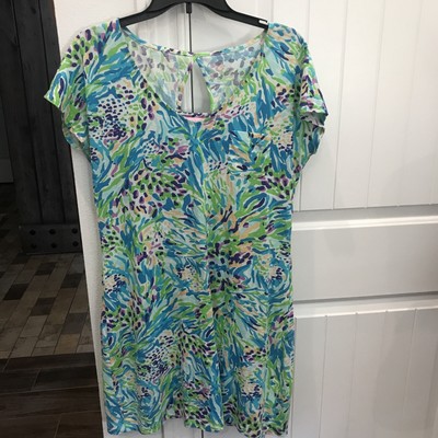 Lilly Pulitzer dress size medium. Pretty blue floral, front pocket, open back