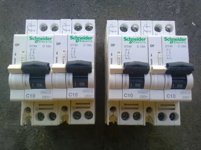 2 x SCHNEIDER DT40 A9N21024 disjoncteur 10A 1P+N courbe C + contact OF