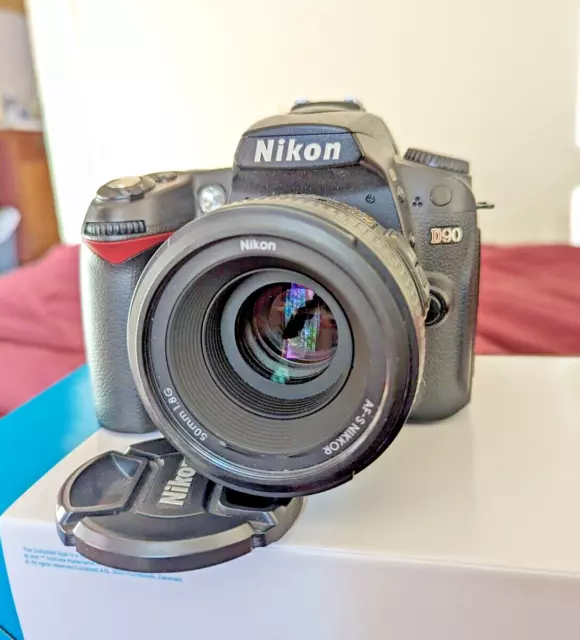 Nikon D90 DSLR Camera with Nikon Lens 50mm 1:1.8 and Nikon Quick Charger