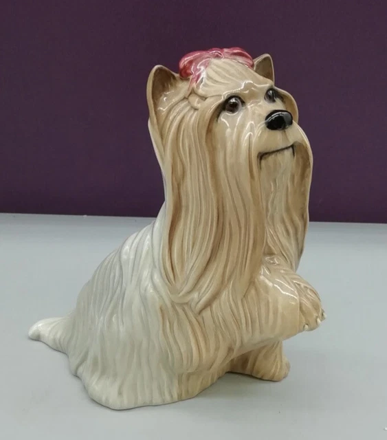 Vintage Royal Doulton Yorkie with raised paw and pink ribbon. 5.25"x 3.5" VGC