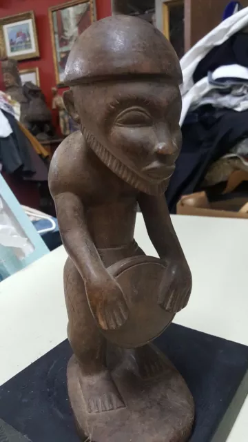 Antique African Wood, hand carved very old Male Statue, standing with Drum