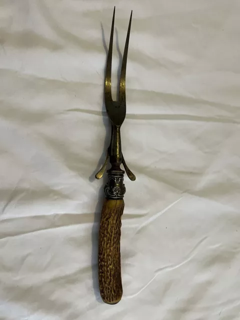 https://www.picclickimg.com/YYYAAOSw4slj46k9/Antique-LATE-1800S-Sterling-Silver-Meat-Carving-Fork.webp
