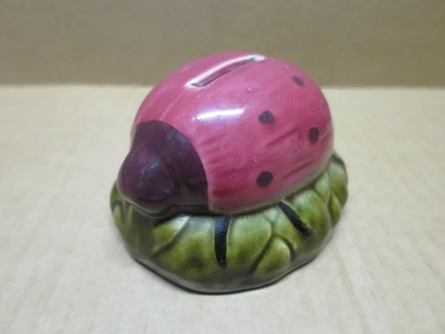 TIRELIRE BARBOTINE polychrome en forme de coccinelle