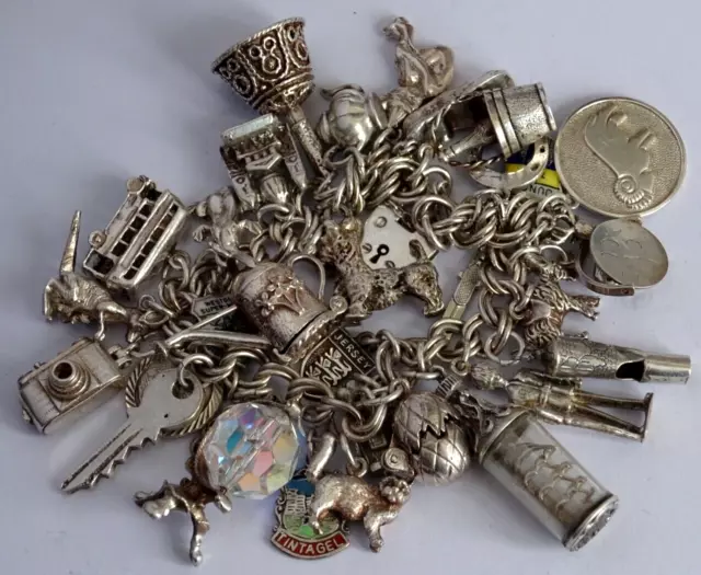 Vintage 108g solid silver charm bracelet & 30 silver charms inc opening,moving