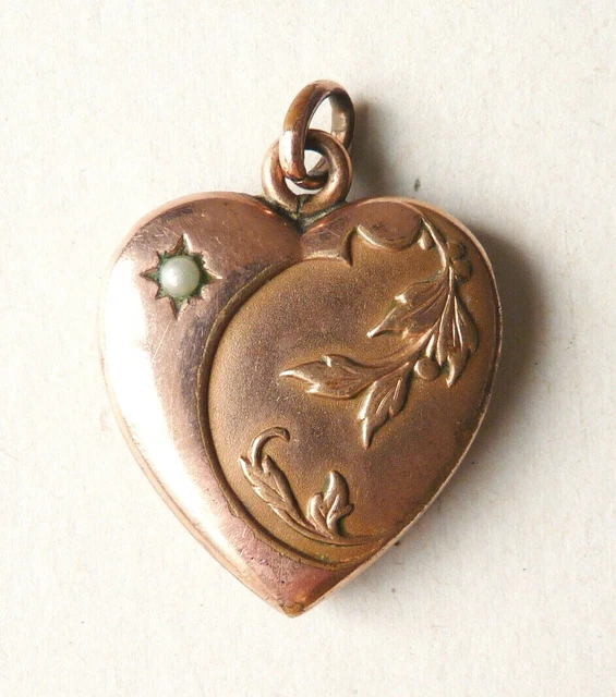 Pendentif argent, porte-photo en forme de coeur et ouvragé. - Bijoux Anciens Schaffner