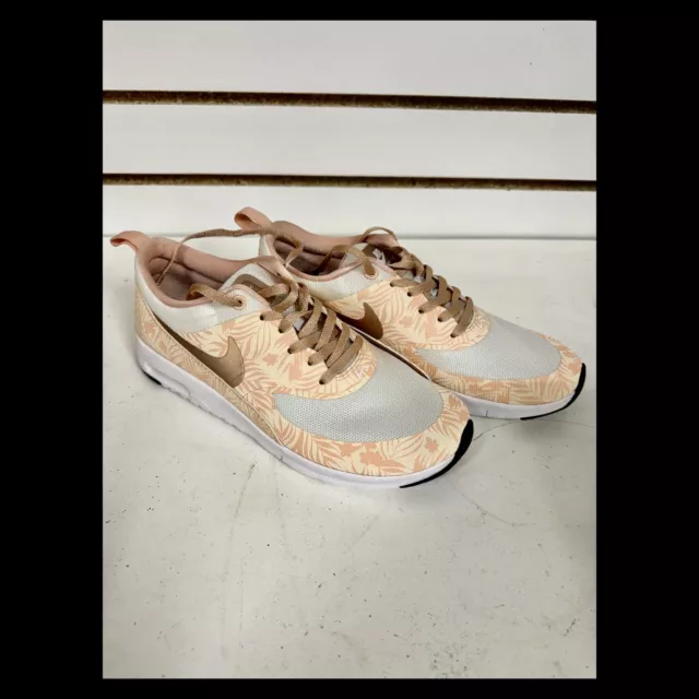 Nike thea print beige hotsell