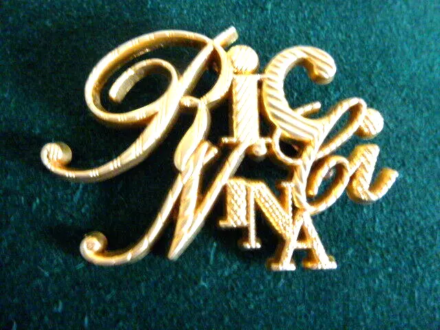 Belle Broche NINA RICCI dore TRES BON etat