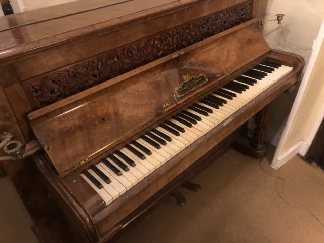 Burr walnut upright piano by C. Knoll from Erard’s