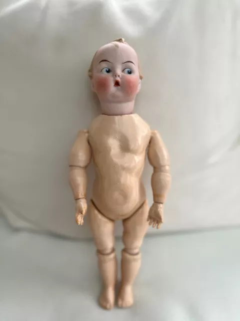 antique porcelain head doll - Gebrüder Heubach -Googlie * Googly