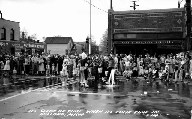 RPPC Postcard Tulip Time Holland Michigan MI Dutch Dancers Street Scrubbing VTG