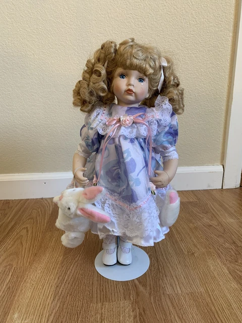 heritage signature collection porcelain doll “Amanda Holding Hurt Bunny”