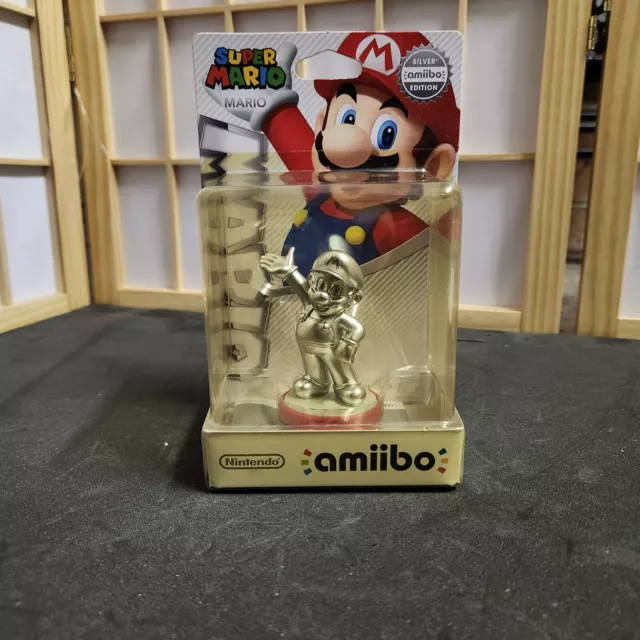 SILVER Mario Amiibo brand NEW Unopened Super Rare Limited Edition *Yellowing...