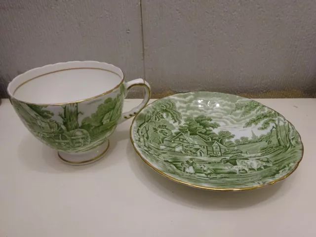 A vintage H M Sutherland Bone China CUP & SAUCER Rural Scenes Green Gold gilt