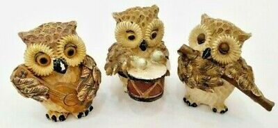 vintage Statues of owls playing musical instruments made of Resin hand painted