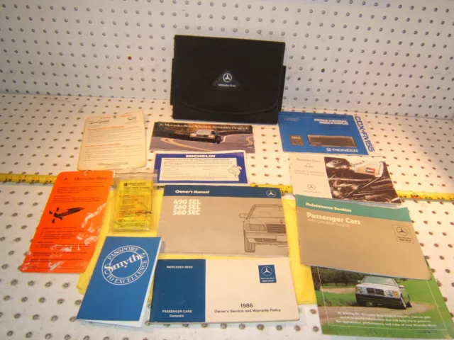 Mercedes 1986 W126 SEL SEC US Owner's Manuals 1 set of 12 & OEM Mercedes 1 Pouch