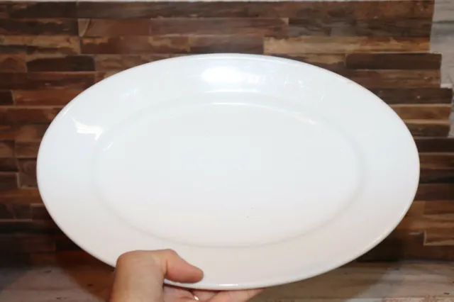 ancien grand plat ovale en porcelaine blanche pillivuyt