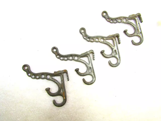 Vintage cast iron coat/hat hangers. 4 pieces