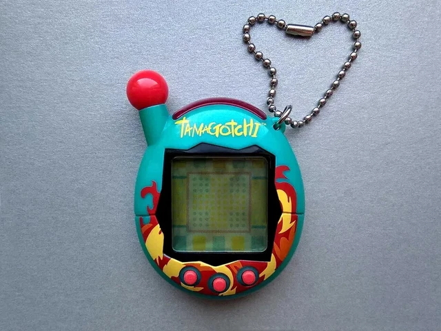 2004 Bandai Tamagotchi Connection V4 Flames Blue Digital Virtual Pet Toy