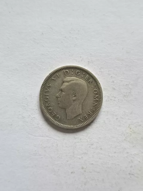 A 1945 King George VI (VF) sixpence coin