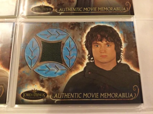 Topps- LOTR Evolution-costume Card- Frodo’s Travel Cloak
