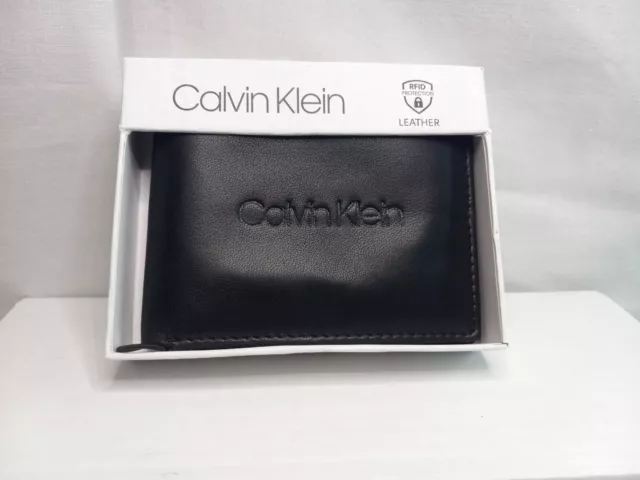 Calvin Klein Mens Wallet Black Calvin Klein Spelled out RFID protection.