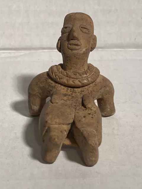 Pre Columbian Colima terra cotta figure laying prostrate- Nancarrow Collection