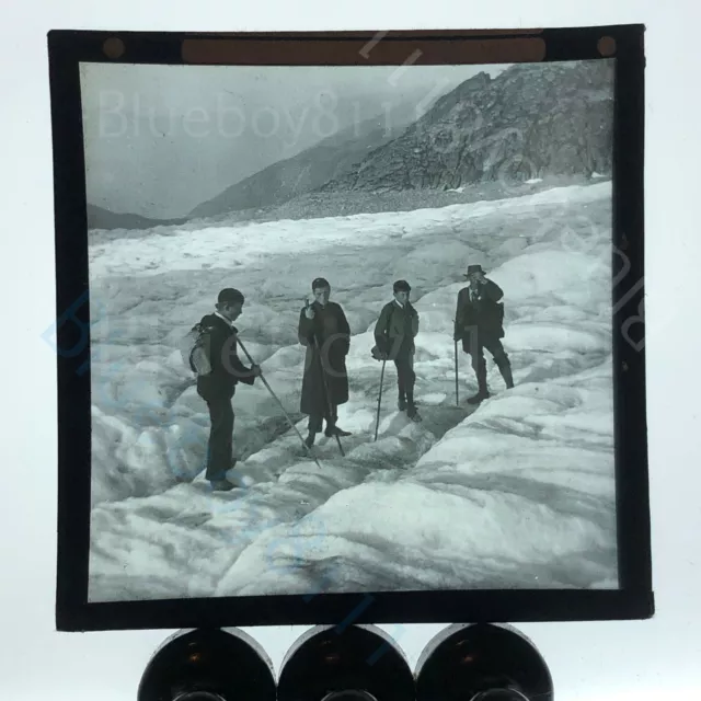 Edwardian men on alpine glacier magic lantern