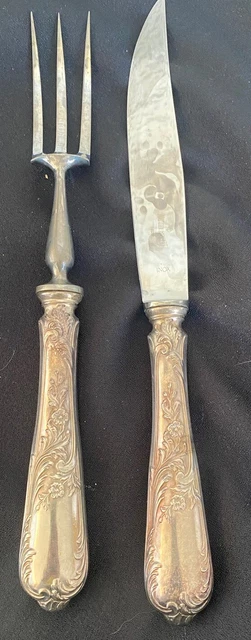 RAVINET D'ENFERT. Ménagère en métal argenté comprenant trois dessous de
