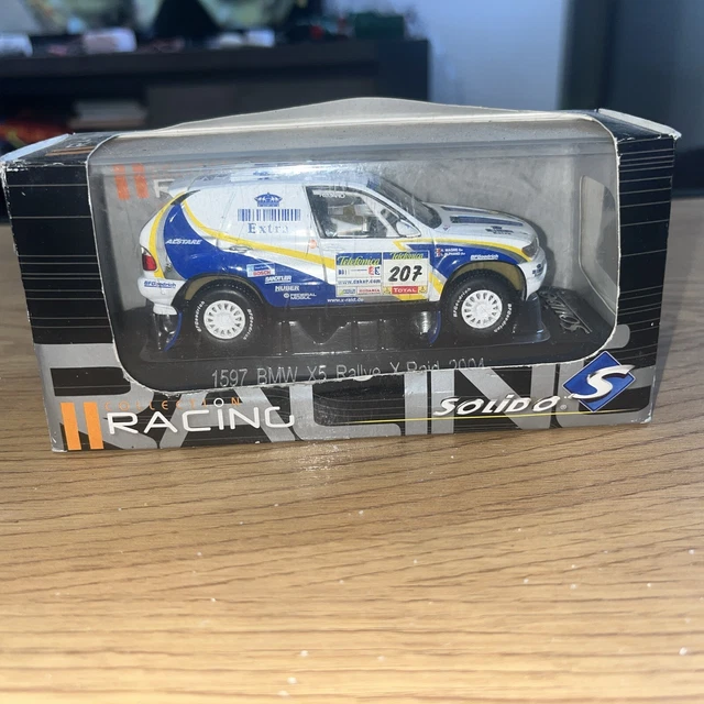 MITSUBISHI PAJERO RALLYE NÂ°203 PARIS DAKAR 2004 PETERHANSEL NOREV 143 1er
