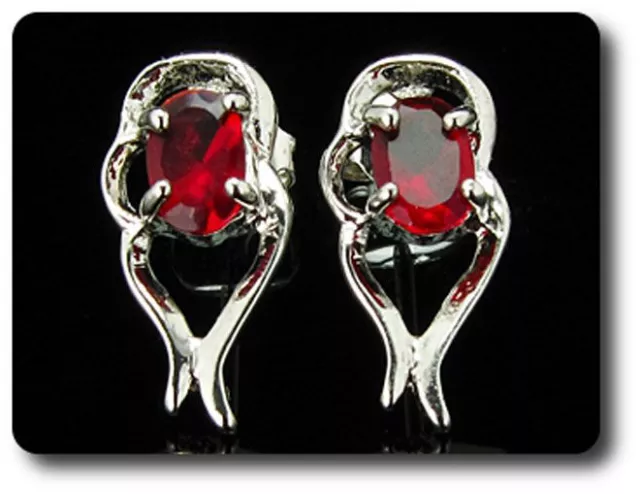 BOUCLES D'OREILLE RUBIS 2x7 mm Plaqué Or blanc 18 K.