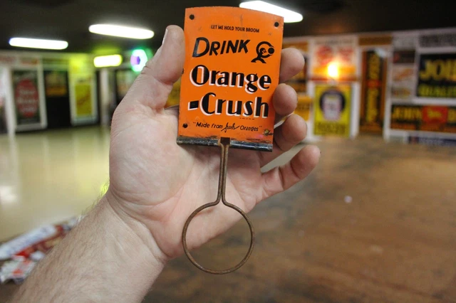 RARE 1930s DRINK ORANGE CRUSH SODA POP BROOM HOLDER PAINTED METAL SIGN COKE