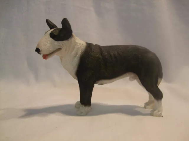 Statue de collection CANINE KINGDOM  - Chien  BULL TERRIER BRINGE DEBOUT