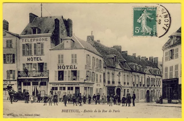 cpa 60 animated - BRETEUIL (Oise) Entrance de la Rue de PARIS CAFÉ HOTEL du COMMERCE