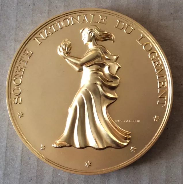 Médaille bronze doré Belge "Société Nationale du logement" 1976