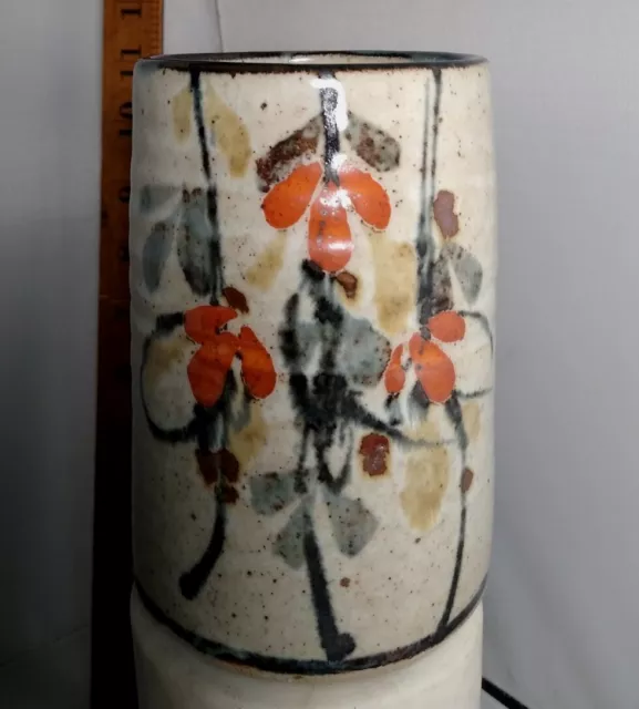 Studio pottery thin vase with floral design by Colin Kellam