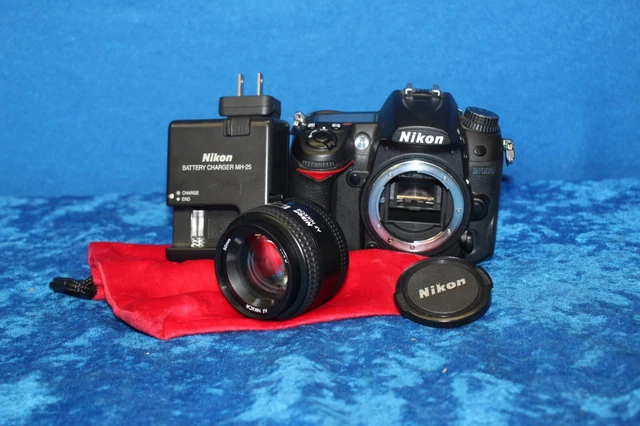 Nikon D7000 16.2 MP Digital SLR Camera CMOS w/ 3" Screen, AF NIKKOR 50mm Lens