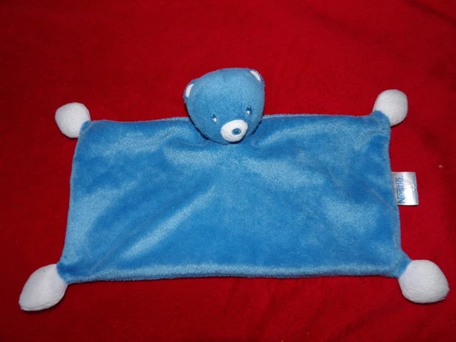 Doudou Plat Ours Rectangle NESTLE BLEU 4 Pompons Blancs