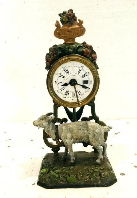 pendulette en régule polychrome thème la chèvre de monsieur Seguin  . XX siècle.